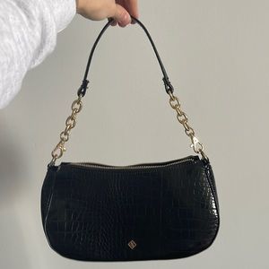 Black shiny vegan crocodile leather baguette bag with gold hardware